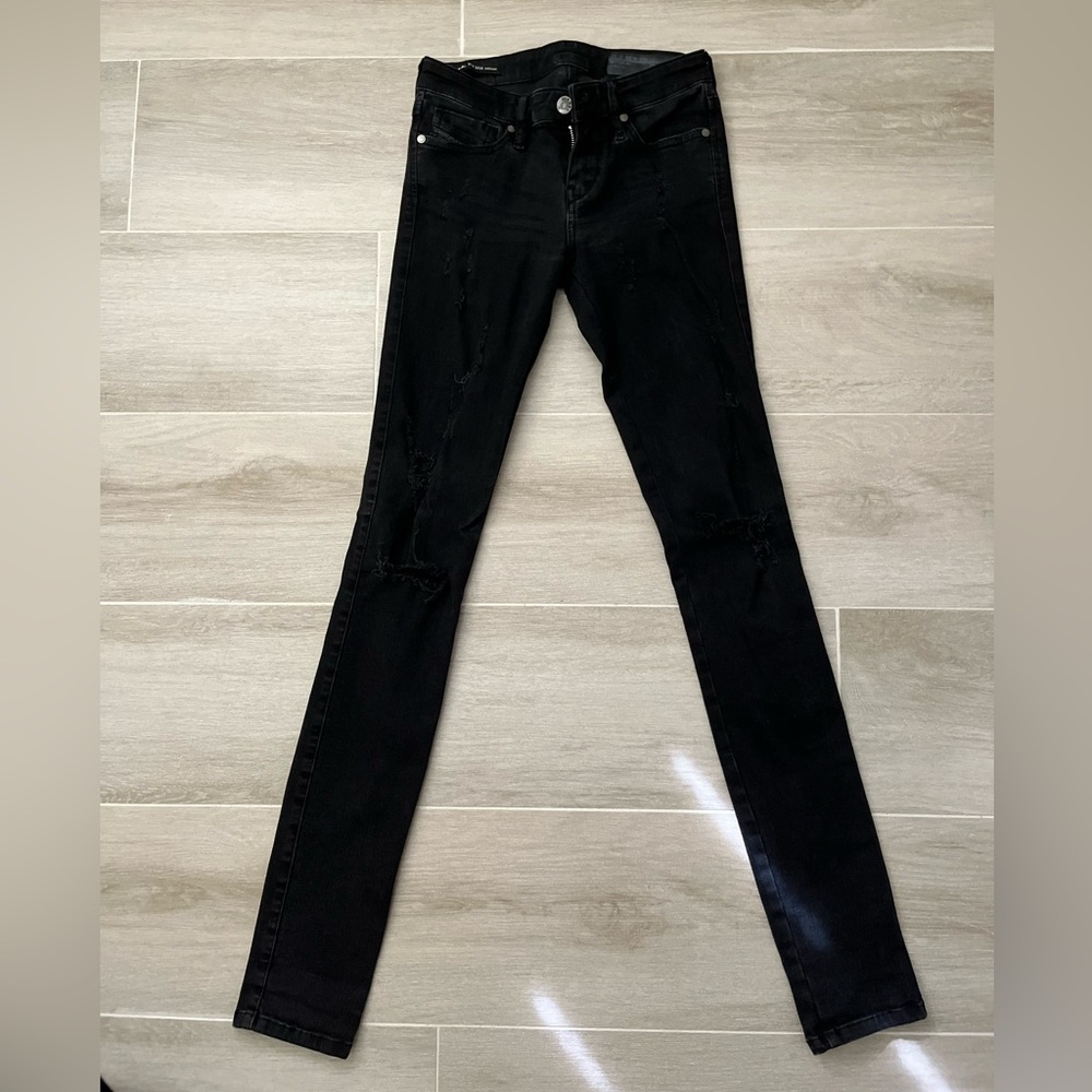 Ripped skinny low cut black jeans
